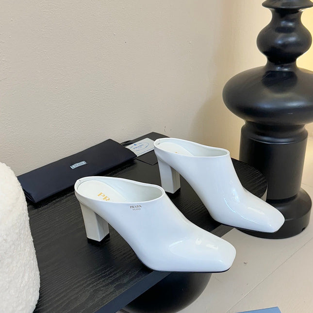 HIGH HEEL MULES WITH GOLD LETTERING LOGO IN WHITE GLOSSY CALFSKIN