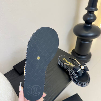 PLATFORM FLIP-FLOPS IN BLACK TWEED FABRIC