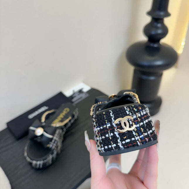 PLATFORM FLIP-FLOPS IN BLACK TWEED FABRIC