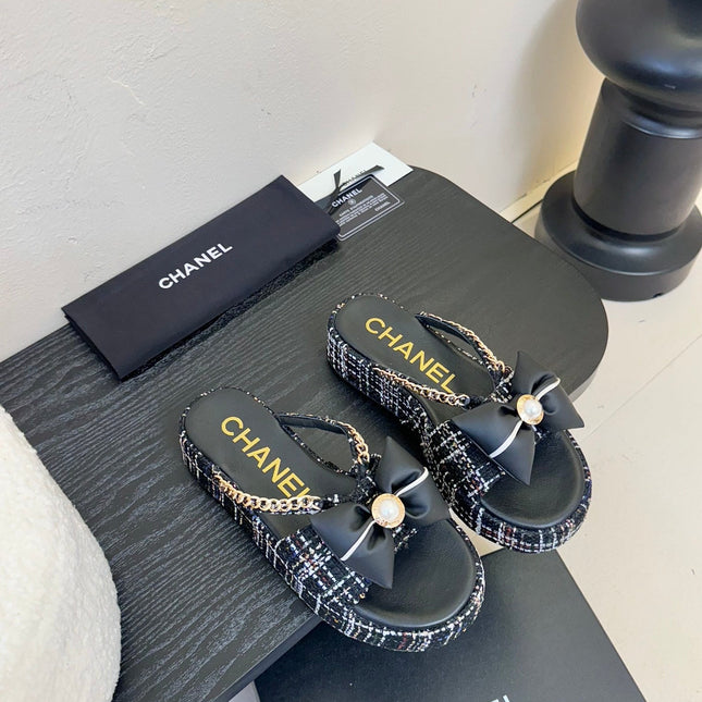 PLATFORM FLIP-FLOPS IN BLACK TWEED FABRIC