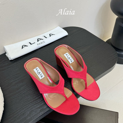 ALAIA WEDGE THONG SANDALS 25S IN RED SATIN
