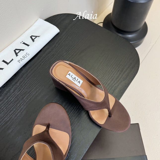 ALAIA WEDGE THONG SANDALS 25S IN BROWN SATIN