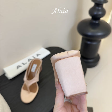 ALAIA WEDGE THONG SANDALS 25S IN BLUSH BEIGE SATIN
