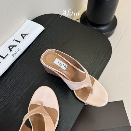 ALAIA WEDGE THONG SANDALS 25S IN BLUSH BEIGE SATIN