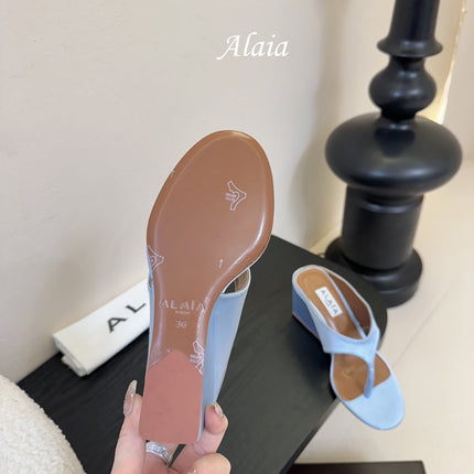 ALAIA WEDGE THONG SANDALS 25S IN BLUE SATIN