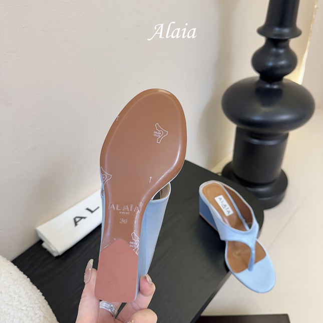 ALAIA WEDGE THONG SANDALS 25S IN BLUE SATIN