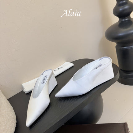 ALAIA HIGH MULES 25S IN WHITE SATIN