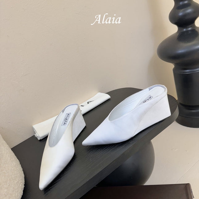 ALAIA HIGH MULES 25S IN WHITE SATIN