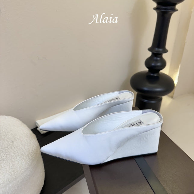 ALAIA HIGH MULES 25S IN WHITE SATIN