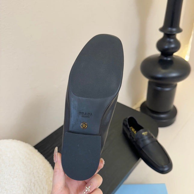 PRADA 25S SHUFFLE LOAFERS IN BLACK CALFSKIN