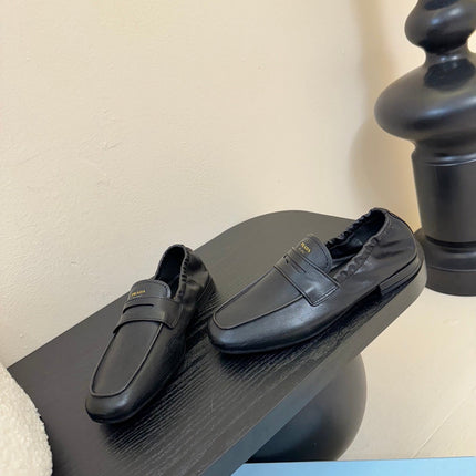PRADA 25S SHUFFLE LOAFERS IN BLACK CALFSKIN