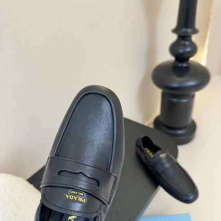 PRADA 25S SHUFFLE LOAFERS IN BLACK CALFSKIN