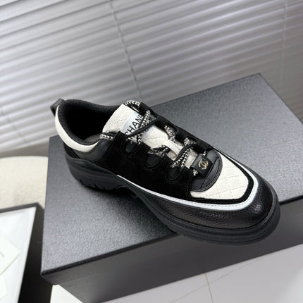 CHANEL 25S SNEAKERS 35MM IN BLACK AND WHITE CALFSKIN