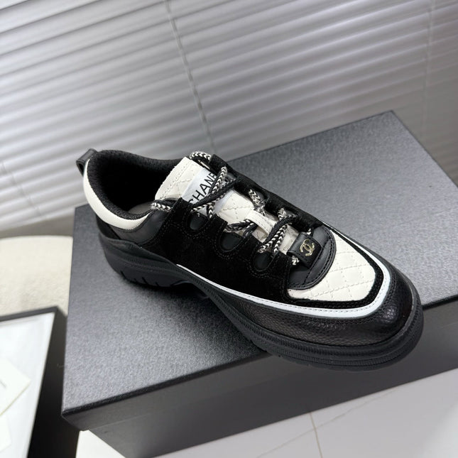 CHANEL 25S SNEAKERS 35MM IN BLACK AND WHITE CALFSKIN