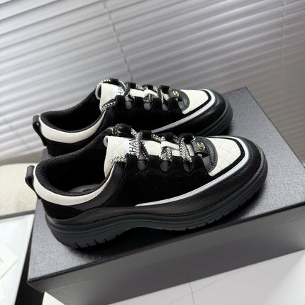 CHANEL 25S SNEAKERS 35MM IN BLACK AND WHITE CALFSKIN
