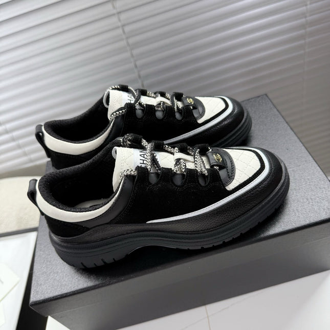 CHANEL 25S SNEAKERS 35MM IN BLACK AND WHITE CALFSKIN