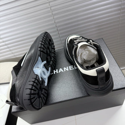 CHANEL 25S SNEAKERS 35MM IN BLACK AND WHITE CALFSKIN