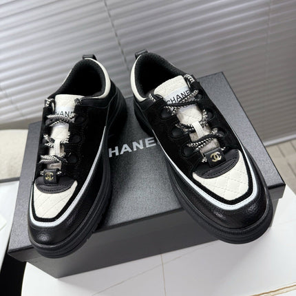CHANEL 25S SNEAKERS 35MM IN BLACK AND WHITE CALFSKIN