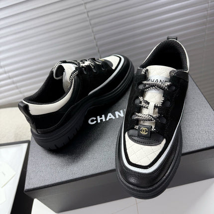 CHANEL 25S SNEAKERS 35MM IN BLACK AND WHITE CALFSKIN