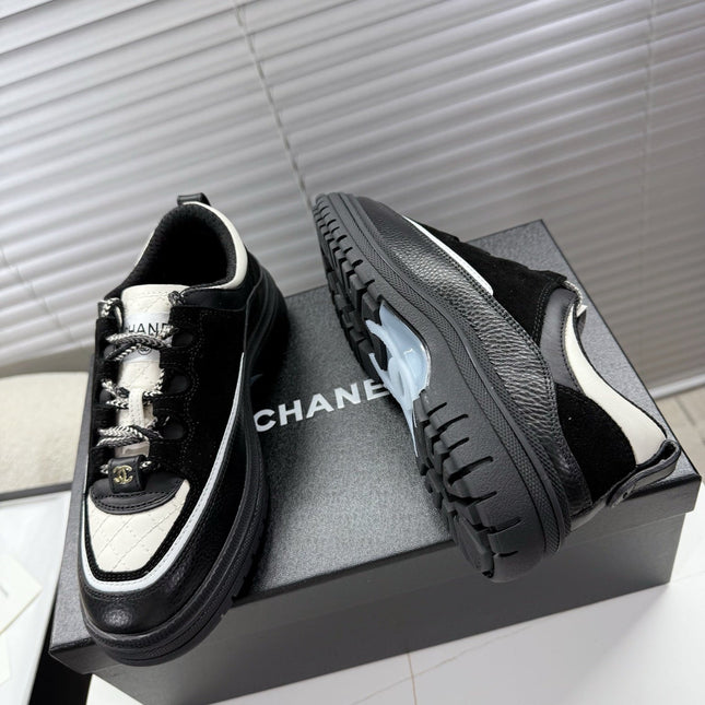 CHANEL 25S SNEAKERS 35MM IN BLACK AND WHITE CALFSKIN