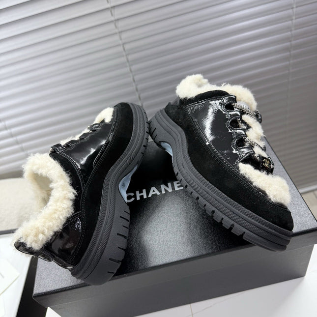CHANEL 25S SNEAKERS WITH FUR ACCENTS 35MM IN BLACK CALFSKIN