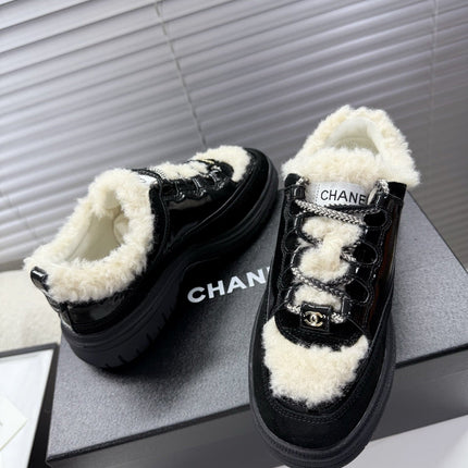 CHANEL 25S SNEAKERS WITH FUR ACCENTS 35MM IN BLACK CALFSKIN