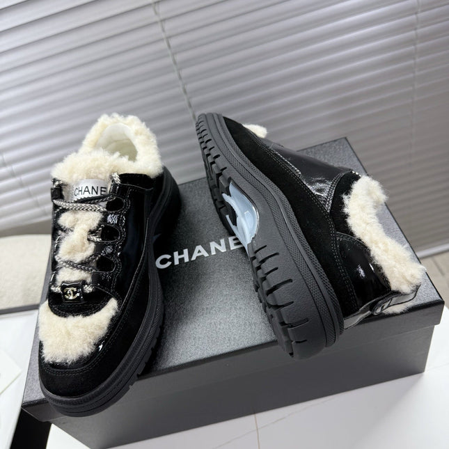 CHANEL 25S SNEAKERS WITH FUR ACCENTS 35MM IN BLACK CALFSKIN