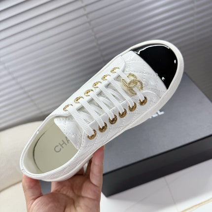 CHANEL 25S TRAINERS WHITE AND BLACK 35MM IN CALFSKIN