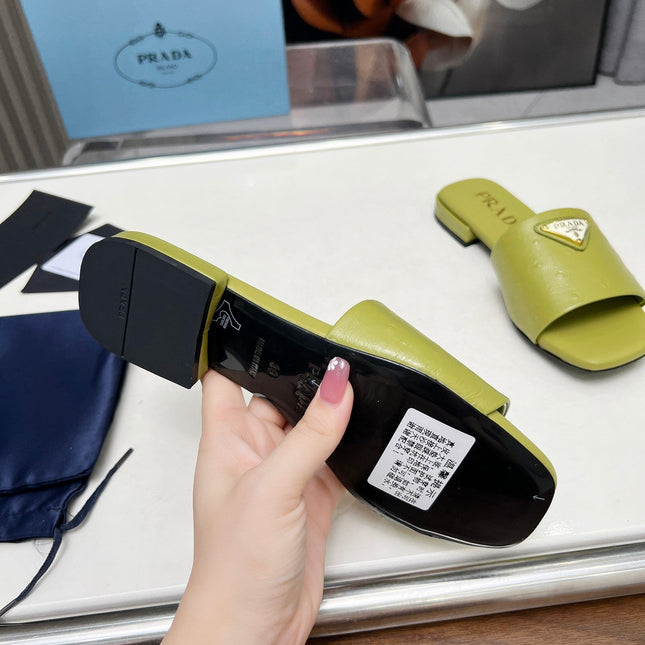 PRA SAFFIANO PATENT SLIDES OSTRICH MOTIF PEAR CALFSKIN