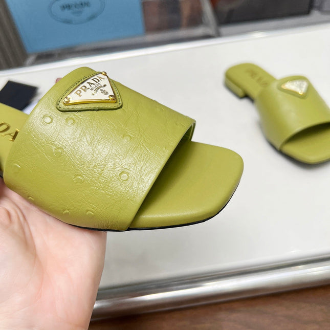 PRA SAFFIANO PATENT SLIDES OSTRICH MOTIF PEAR CALFSKIN