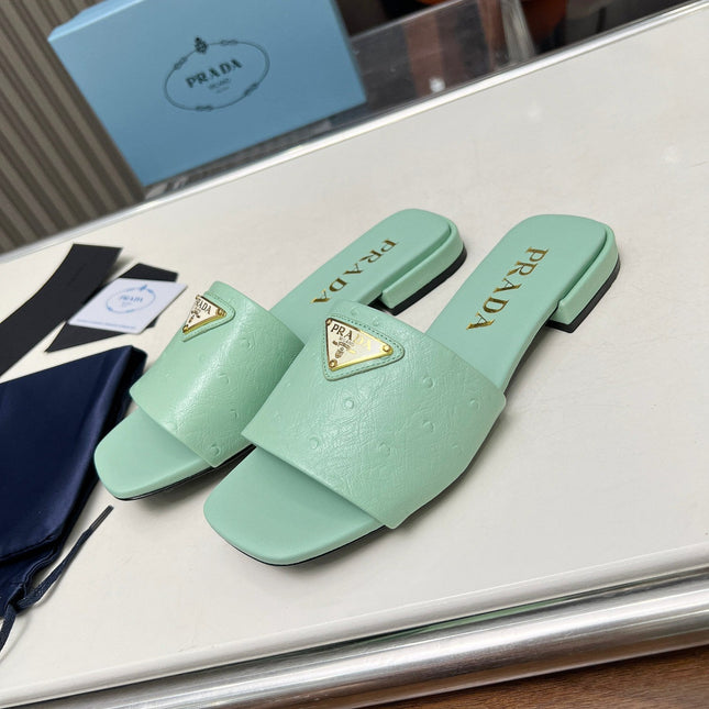 PRA SAFFIANO PATENT SLIDES OSTRICH MOTIF SEAFOAM CALFSKIN