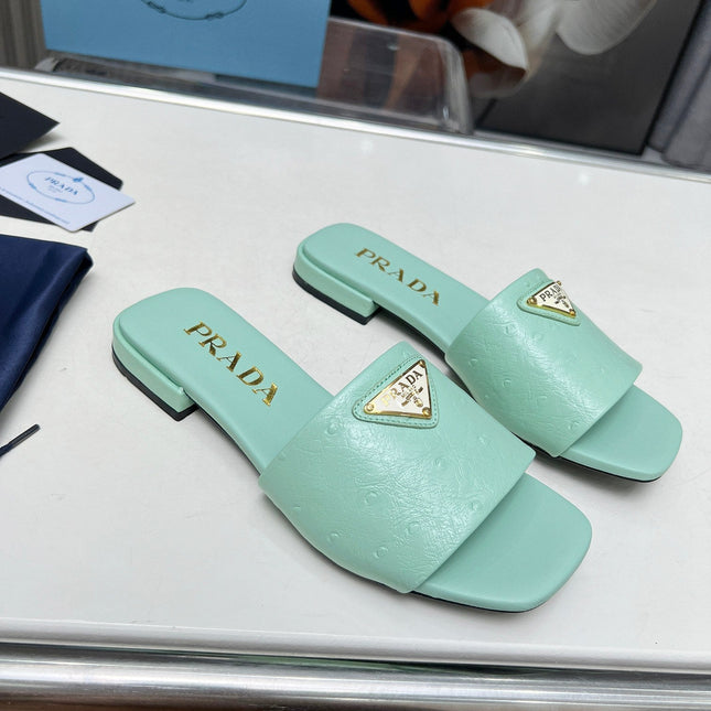 PRA SAFFIANO PATENT SLIDES OSTRICH MOTIF SEAFOAM CALFSKIN