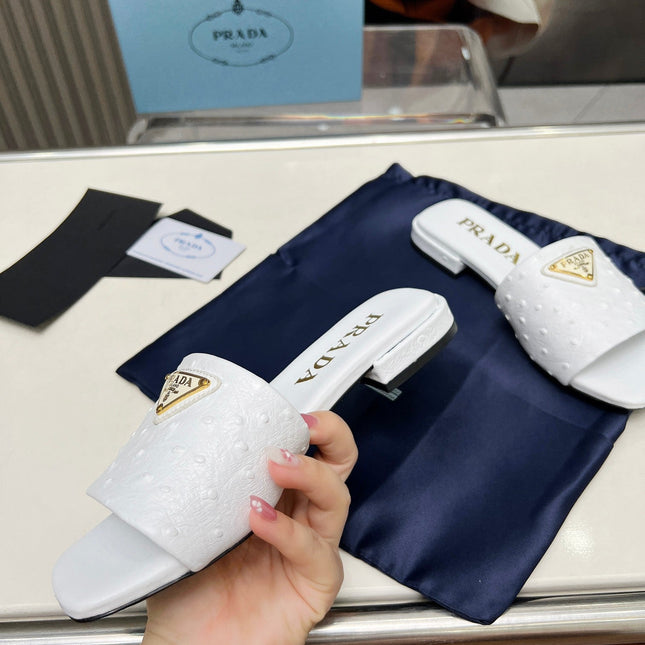 PRA SAFFIANO PATENT SLIDES OSTRICH MOTIF WHITE CALFSKIN