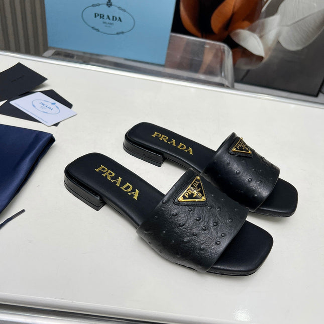 PRA SAFFIANO PATENT SLIDES OSTRICH MOTIF BLACK CALFSKIN