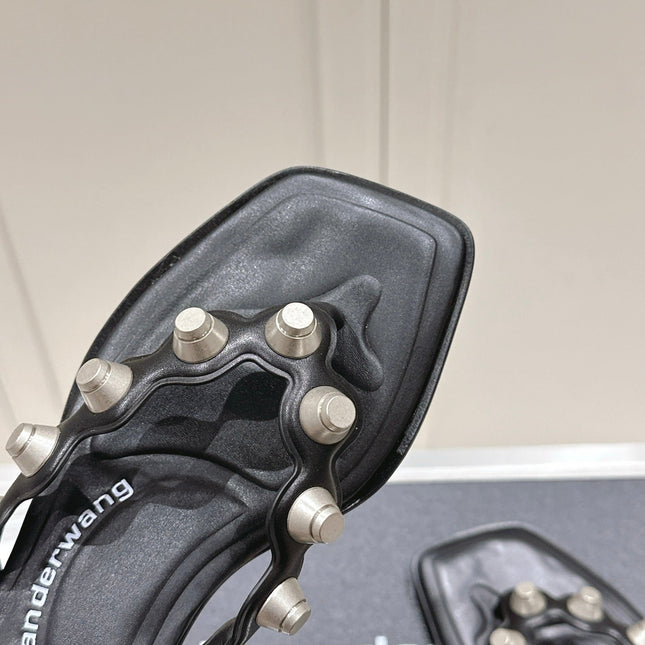 RHODES STUDDED THONG SANDALS IN BLACK CALFSKIN