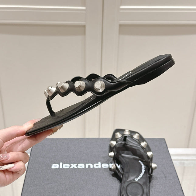 RHODES STUDDED THONG SANDALS IN BLACK CALFSKIN