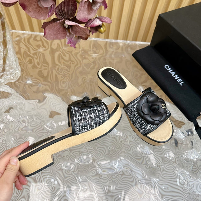 PLATFORM SLIPPERS WITH FLOWER IN BLACK LAMBSKIN