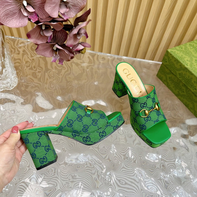 HORSEBIT SLIDE SANDAL IN FOREST GREEN MONOGRAM CANVAS AND SHEEPSKIN LINING