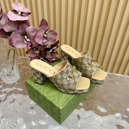 HORSEBIT SLIDE SANDAL IN ECRU BEIGE MONOGRAM CANVAS AND SHEEPSKIN LINING