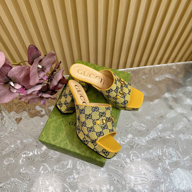 HORSEBIT SLIDE SANDAL IN TUSCANY YELLOW MONOGRAM CANVAS AND SHEEPSKIN LINING
