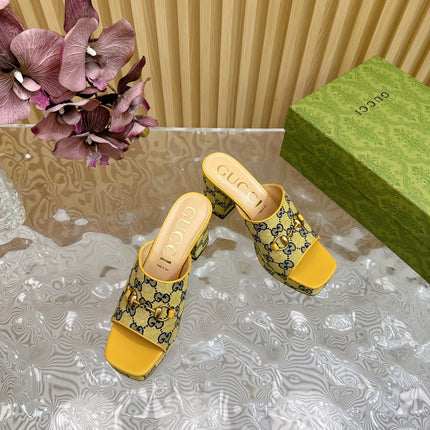 HORSEBIT SLIDE SANDAL IN TUSCANY YELLOW MONOGRAM CANVAS AND SHEEPSKIN LINING