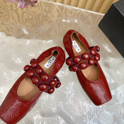 ALAIA MARY JANE PEARL IN GLOSSY MARS RED LAMBSKIN