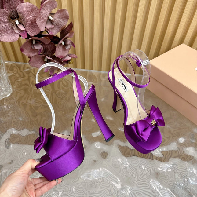HIGH BOW PLATFORM IN VIOLET SILK