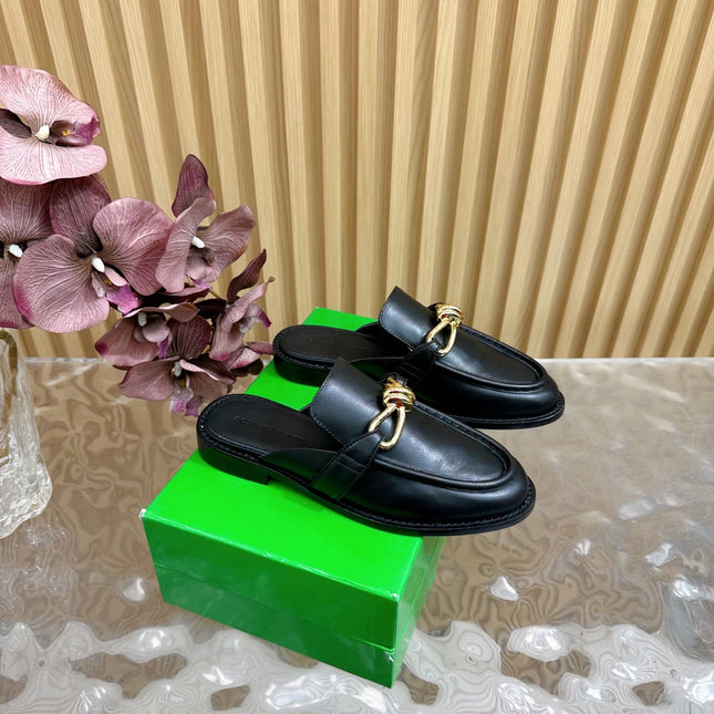 OPEN-BACK LOAFER REALISED IN BLACK SOFT CALFSKIN WITH SIGNATURE METALLIC KNOT DETAIL