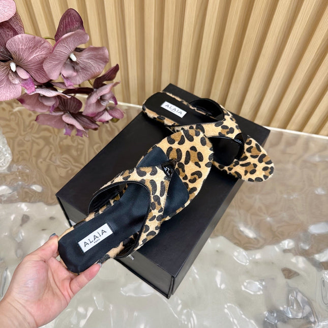 ALAIA PLATFORM THONG SANDALS 25S IN LEOPARD PONY HAIR LEATHER