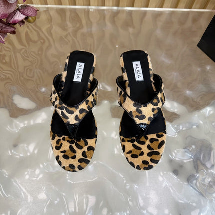 ALAIA PLATFORM THONG SANDALS 25S IN LEOPARD PONY HAIR LEATHER