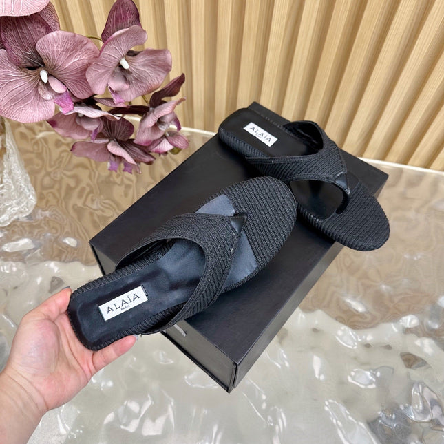 ALAIA PLATFORM THONG SANDALS 25S IN BLACK RAFFIA AND CALFSKIN