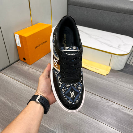LV TRAINER IN BLACK EMBOSSED CALFSKIN AND MONOGRAM FABRIC