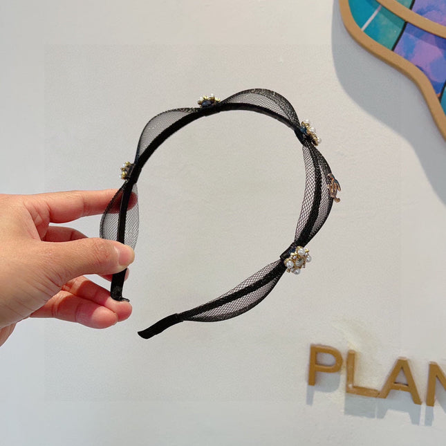 BLACK VOILE FABRIC WITH FLOWER 409382