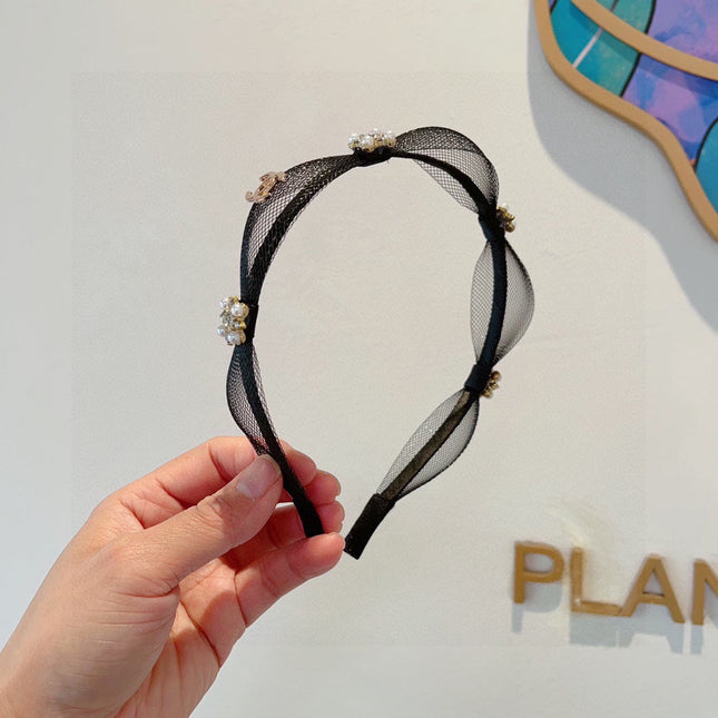 BLACK VOILE FABRIC WITH FLOWER 409382